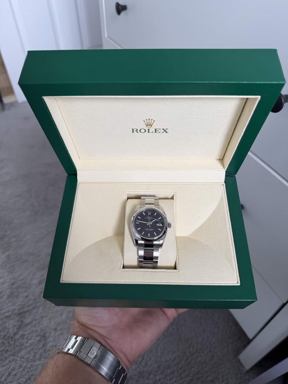 The Rolex, boxed